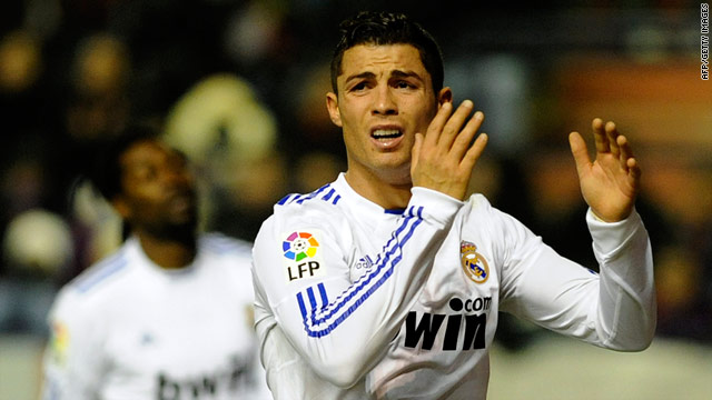 Cristiano Ronaldo reacts after missing a goalscoring opportunity during Real Madrid's defeat by Osasuna.
