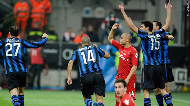 Andrea Ranocchi, far right, celebrates his winning goal for Inter Milan as Cagliari players appeal for offside.