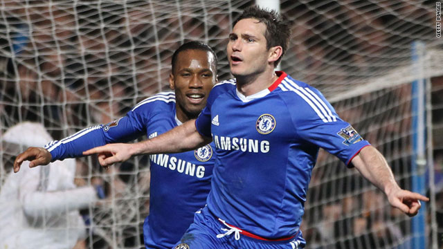 Frank Lampard celebrates with Didier Drogba after scoring the penalty that helped Chelsea beat Manchester United.