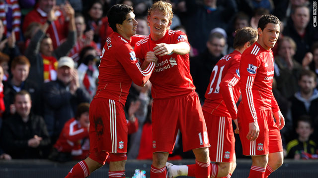 Dirk Kuyt (right) scored the first hat-trick of his Liverpool career as Manchester United slumped to defeat at Anfield.