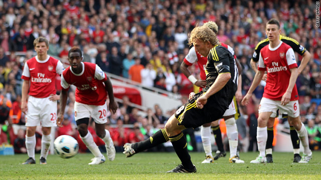 Dirk Kuyt's late penalty for Liverpool could have extended Arsenal's six-year wait for silverware.