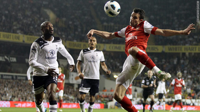 Arsenal striker Robin van Persie, right, had the ball in the net twice during the London derby but the second was ruled offside.