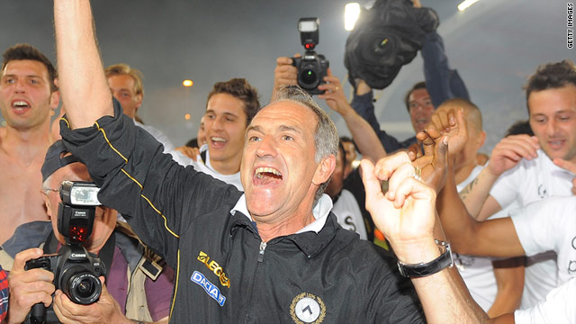 Udinese coach Francescoi Guidolin celebrates as his team qualify for the Champions League.