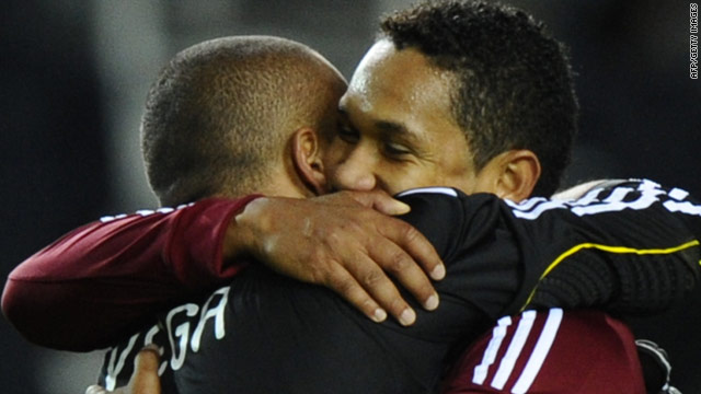 Venezuelan goalkeeper Renny Vega (left) celebrates with teammate Jose Rondon after the 0-0 with Brazil.