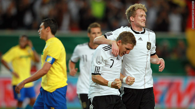 Bastian Schweinsteiger scores the first goal during Germany's 3-2 defeat of Brazil.