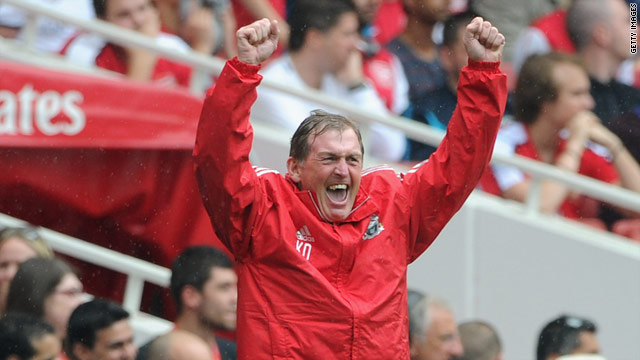Liverpool manager Kenny Dalglish celebrates his team's 2-0 win at Arsenal. 