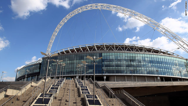 Police have arrested six men after a man died outside Wembley Stadium on Tuesday before a Euro 2012 qualifying match.