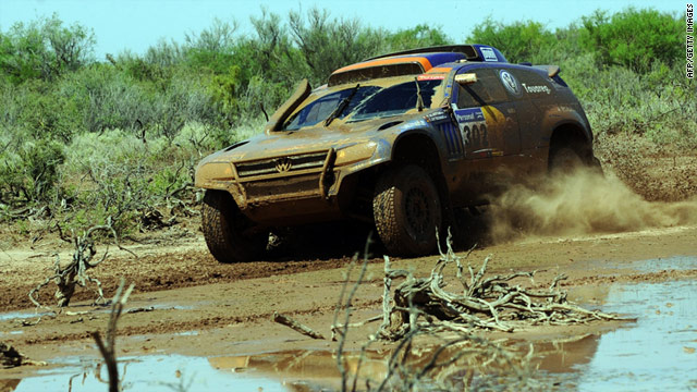 Champion-elect Nasser Al-Attiyah safely guided his Volkswagen through stage 12 from San Juan to Cordoba.