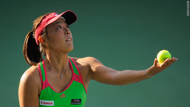 Ayumi Morita of Japan serves on the way to her straight sets win over Petra Kvitova in Dubai. 
