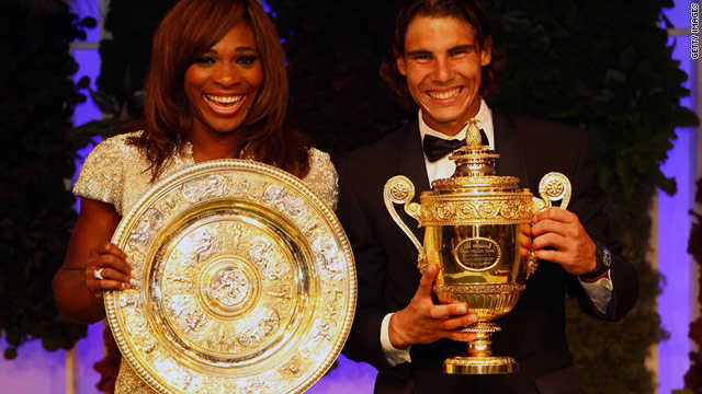 Serena Williams and Rafael Nadal pose with the Wimbledon trophies they secured in 2010.