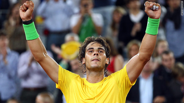 Rafael Nadal celebrates defeating Roger Federer in their semifinal meeting at the Madrid Masters on Saturday.