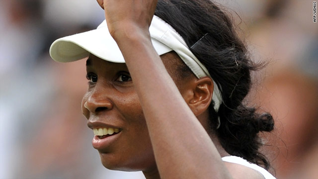 Williams shows her delight after finally closing out Date Krumm on Centre Court.