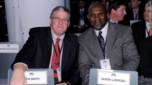 Sportswriter Peter King, left, and Pro Football Hall of Famer Harry Carson attend a Sports Illustrated party in New York.