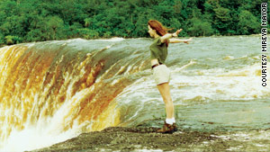 Mireya Mayor gets close to the edge of Guyana's Kaieteur Falls.