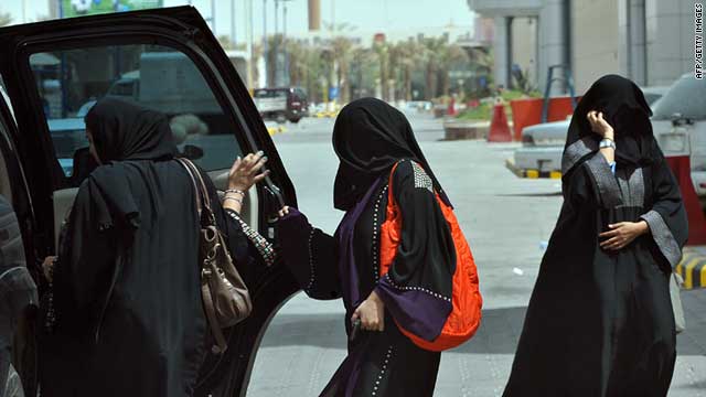 Women get into the backseat of a vehicle in Saudi Arabia's capital Riyadh on June 14, 2011.