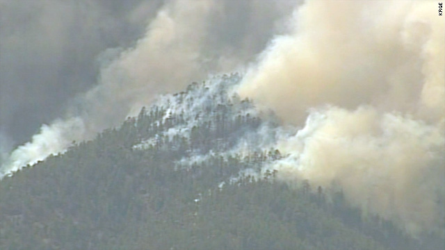 Smoke billows from the Las Conchas fire, which began on June 26 and expanded into the Santa Fe National Forest.