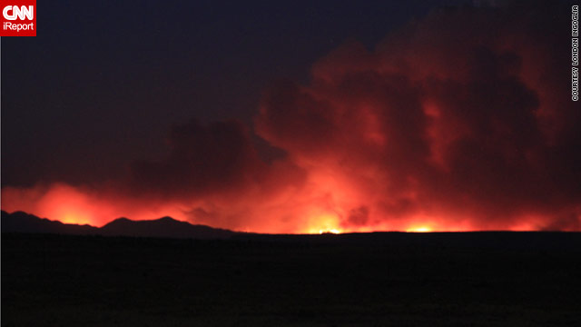 The Las Conchas fire has burned 121,000 acres and destroyed more than 100 buildings, including 63 homes.