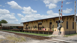 Giddings hopes decorated train depot-style buildings will give travelers a reason to stop and spend.