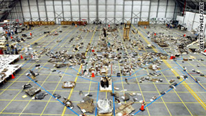 Recovered debris from the space shuttle Columbia lies in a hangar at Kennedy Space Center in May 2003.