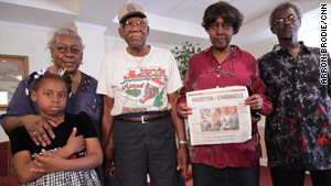 Eight-year-old Ayana Chambliss, left, Delphina and James Lindsey, Shirley Chambliss and Edgar Ned, right, have stayed in Houston.