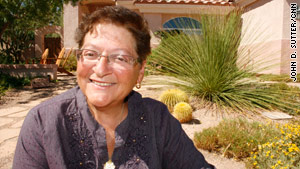 Karen Luksich won a recent contest for water-efficient lawns. Hers is full of low-water desert plants and rocks.