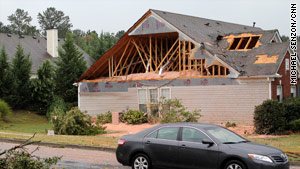 Remnants of Tropical Storm Lee damaged dozens of homes in Woodstock, Georgia.