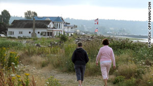 The Wackie Walkers of Point Roberts, Washington, say the strict border checkpoint is the biggest change since 9/11.