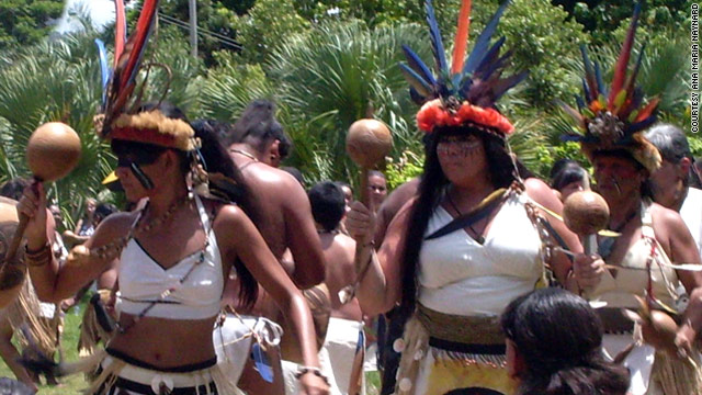 Ana Mara Tekina-eir Maynard, right, dances at the 2010 Tano Day ceremony in Puerto Rico.