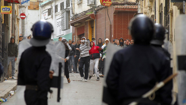 Protestors clash with riot police on January 7, 2011 in central Oran, 430 kilometres (270 miles) west of Algiers.