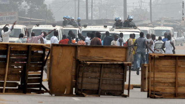 Barricades set up by supporters of incumbent Laurent Gbagbo block U.N. peacekeepers in Abidjan's Abobo neighborhood.