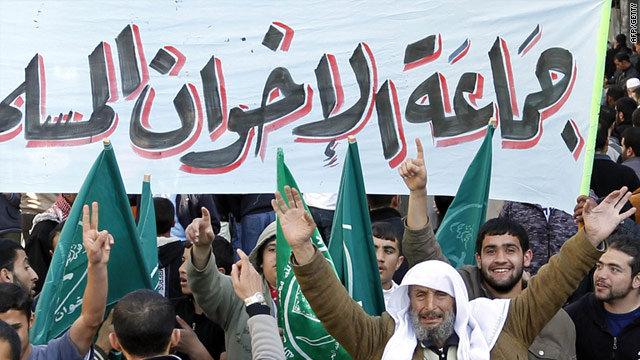 Members of the Muslim Brotherhood movement shout slogans in Amman, Jordan on Friday after weekly prayers.