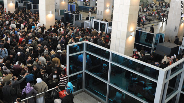 People pack Cairo International Airport this week in an effort to evacuate Egypt.