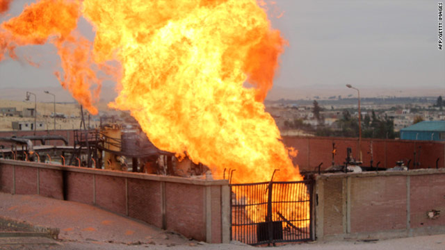 Flames rise from a gas pipeline attack in the Egyptian Sinai town of El Arish on February 5, 2011.