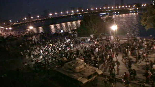Crowds in Cairo erupt in jubilation at the news that President Hosni Mubarak is stepping down.