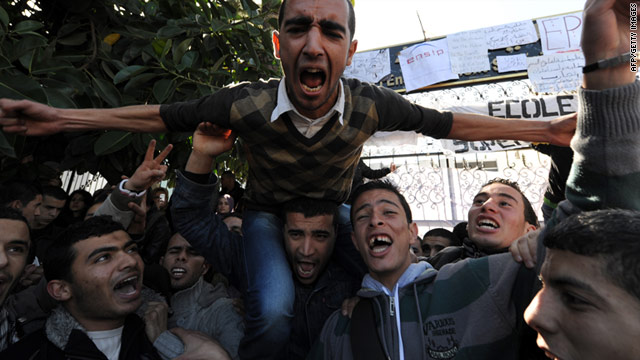 Students protest in Algiers demanding repeal of a decree setting a benefit scheme for public officials.
