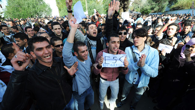 Student protesters shout during a demonstration in Algiers on February 22, 2011.