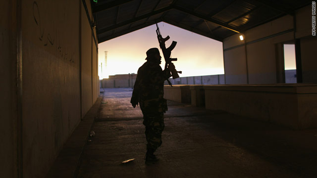 A border guard in an empty customs hall on the Libya-Egyptian border. Fears are easing that al Qaeda will fill the void in Libya.