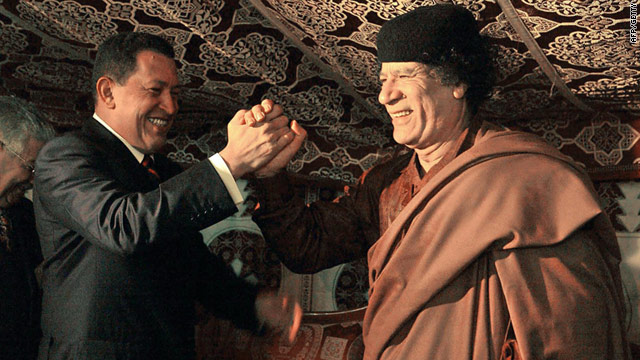 Old friends: Venezuelan president Hugo Chavez (left) meets Libyan leader Moammar Gadhafi in a tent in Tripoli, 2004.