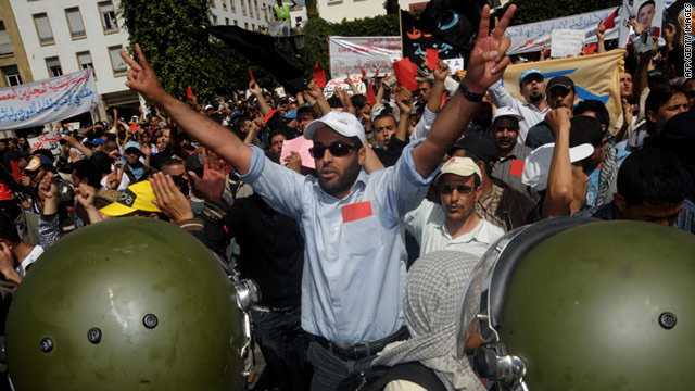 Protesters shout slogans during a demonstration in Rabat on April 8, 2011