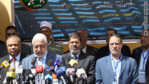Members of Egypt's Muslim Brotherhood announce the formation of the Freedom and Justice Party.