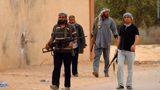 Libyan rebels on patrol near the airport at al-Ghiran close to the key port city of Misrata on April 30, 2011.