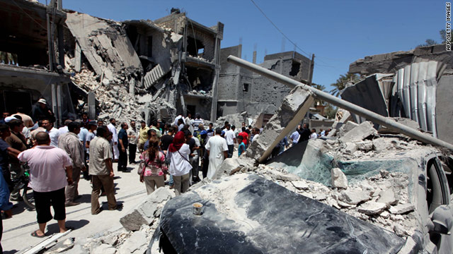 A picture taken on a Libyan government-guided tour on June 18. Libyan authorities said buildings were damaged by NATO airstrikes on Tripoli's residential district of Arada.