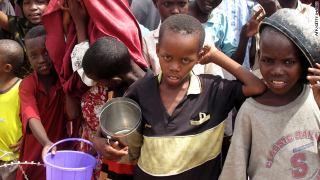 Somali children line up to receive food rations in Mogadishu on July 16.