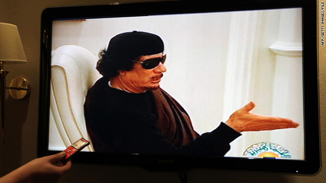 In a photo from May, Libyan state TV shows leader Moammar Gadhafi in what it said was a meeting with eastern tribal dignitaries. NATO acknowledged trying to silence Gadhafi's broadcasts.