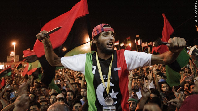 Thousands of Libyans in Benghazi celebrate the arrest of Gadhafi's son Saif al-Islam as rebels enter the capital of Tripoli.