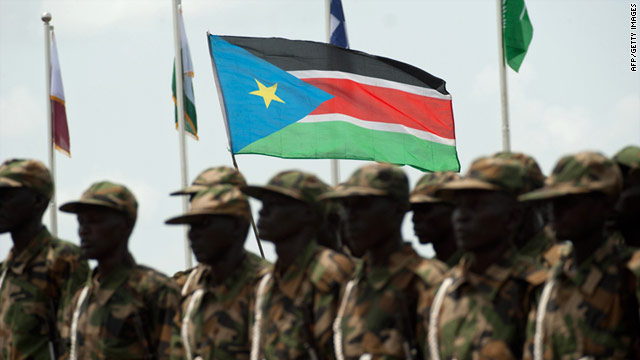 South Sudanese soldiers march with their national flag during a military parade to mark the country's independence in July.