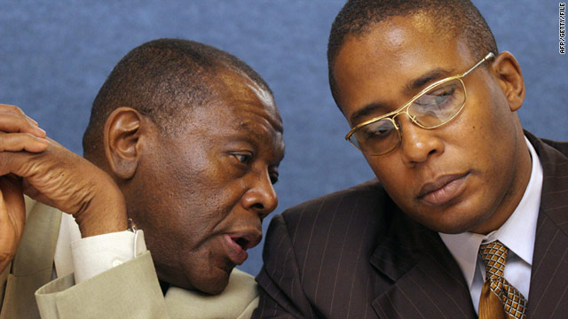 Nation of Islam official Akbar Muhammad, left, was released Friday afternoon, according to his laywer.
