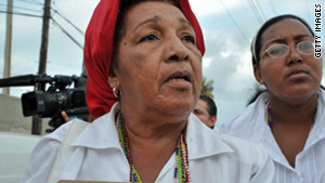 Reina Luisa Tamayo and 12 relatives will land in Miami as political refugees.