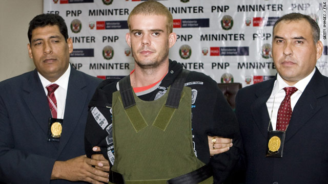 Joran van der Sloot is escorted by Peruvian police in Lima on June 5, 2010.
