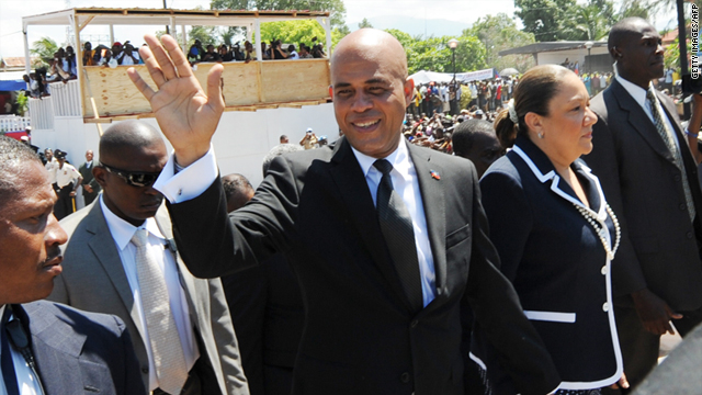 Haitian President Michel Martelly, center,  is struggling to form a  government.